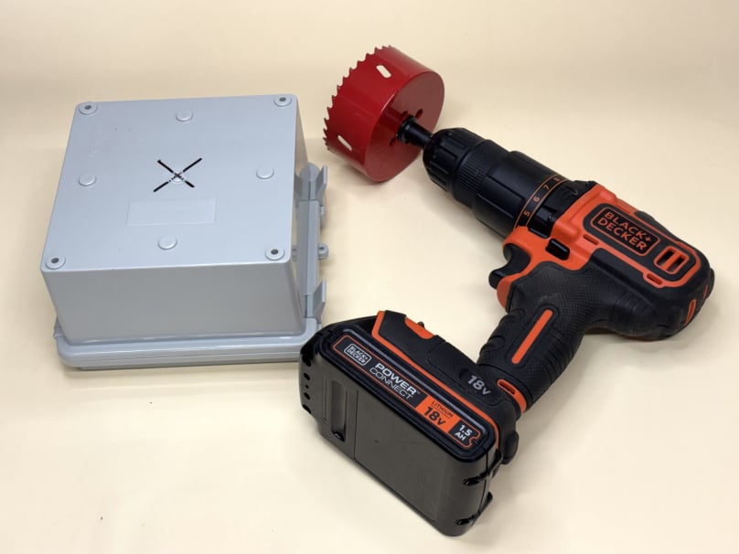 Drill a hole in the junction box